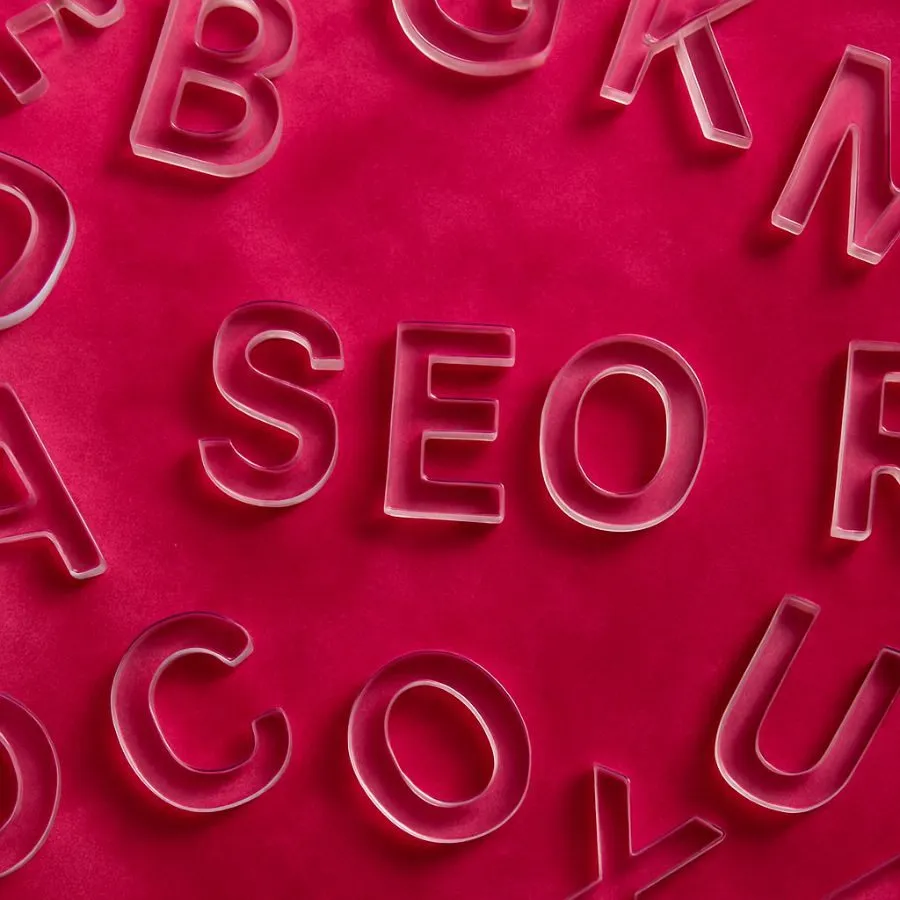 AI SEO in lucite letters on velvet square